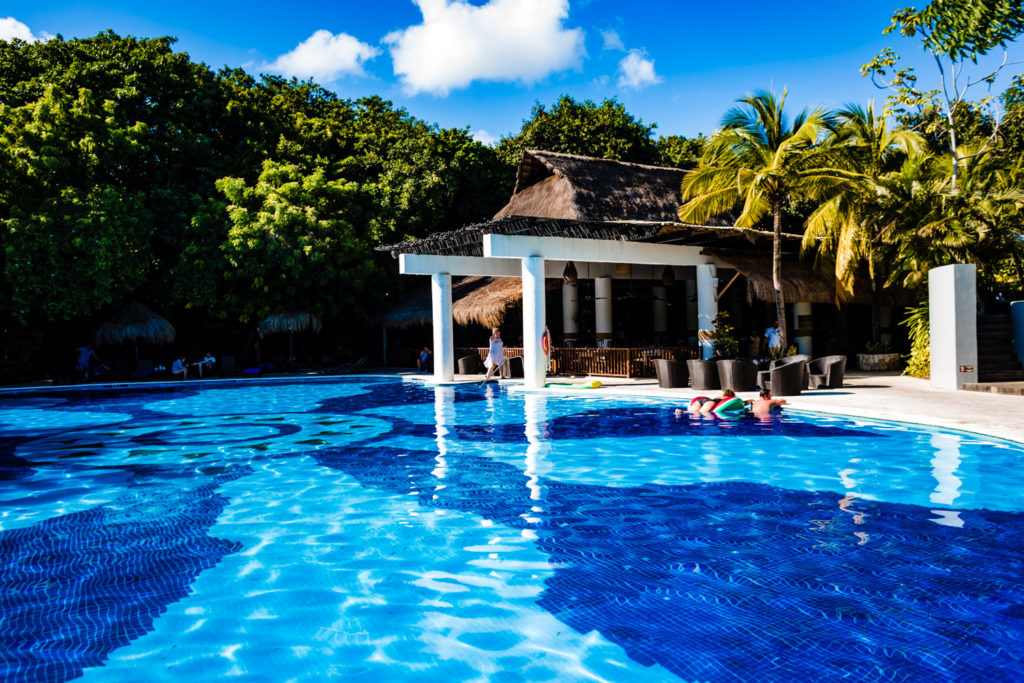 The pool on Sandos Caracol Cenote Wedding Photos