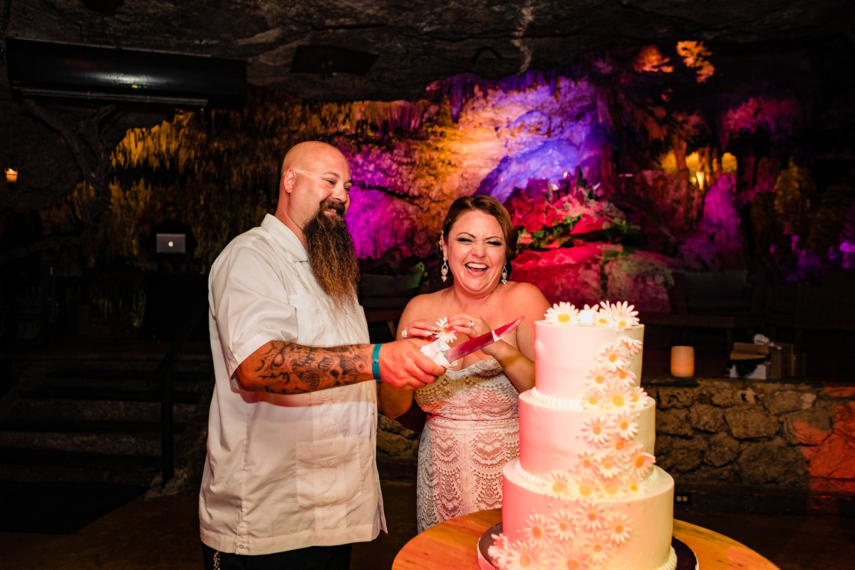 Bride and Groom cutting the cake Playa del Carmen wedding photos
