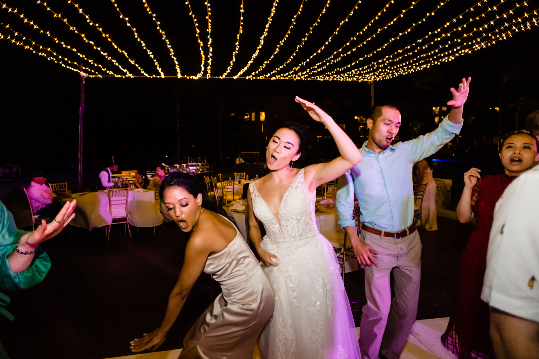 Bride dancing in Dreams Riviera Cancun
