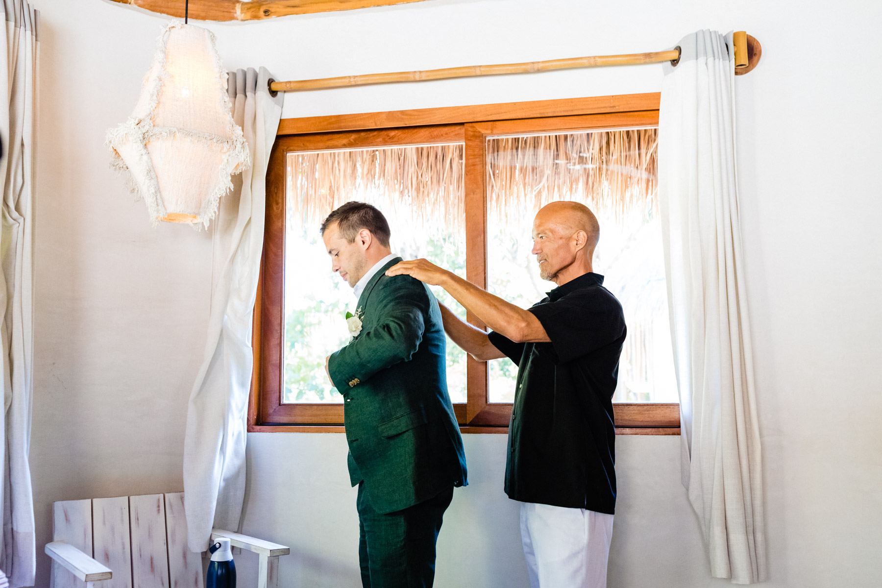 Groom getting ready with his dad 