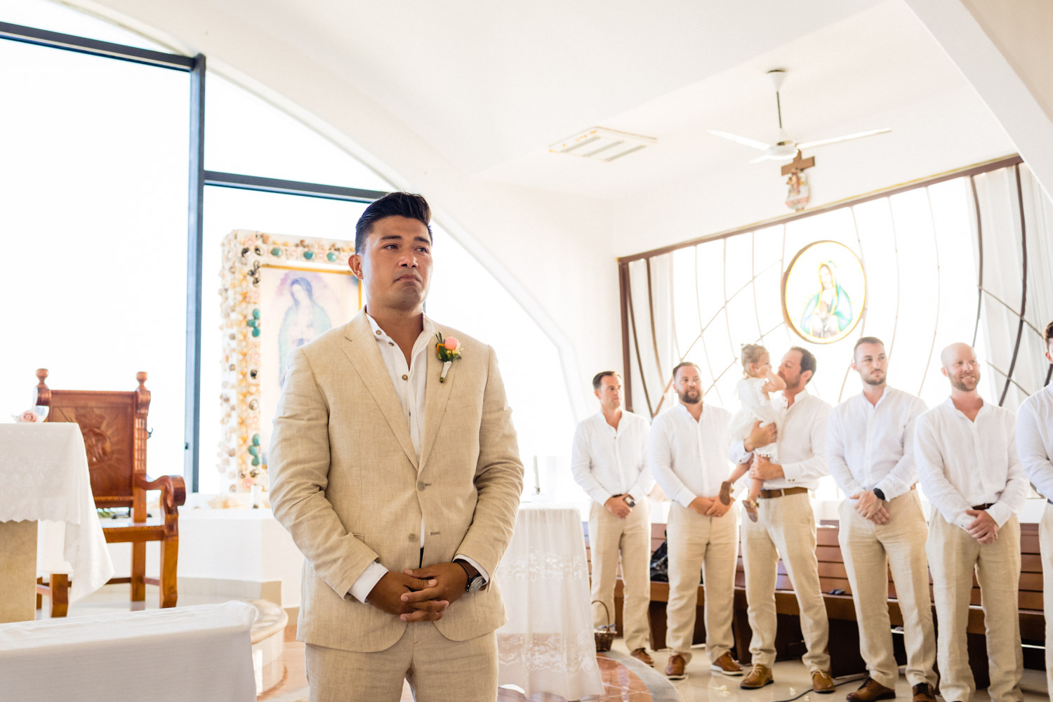 Groom waiting's at Capilla de Guadalupe Isla Mujeres 